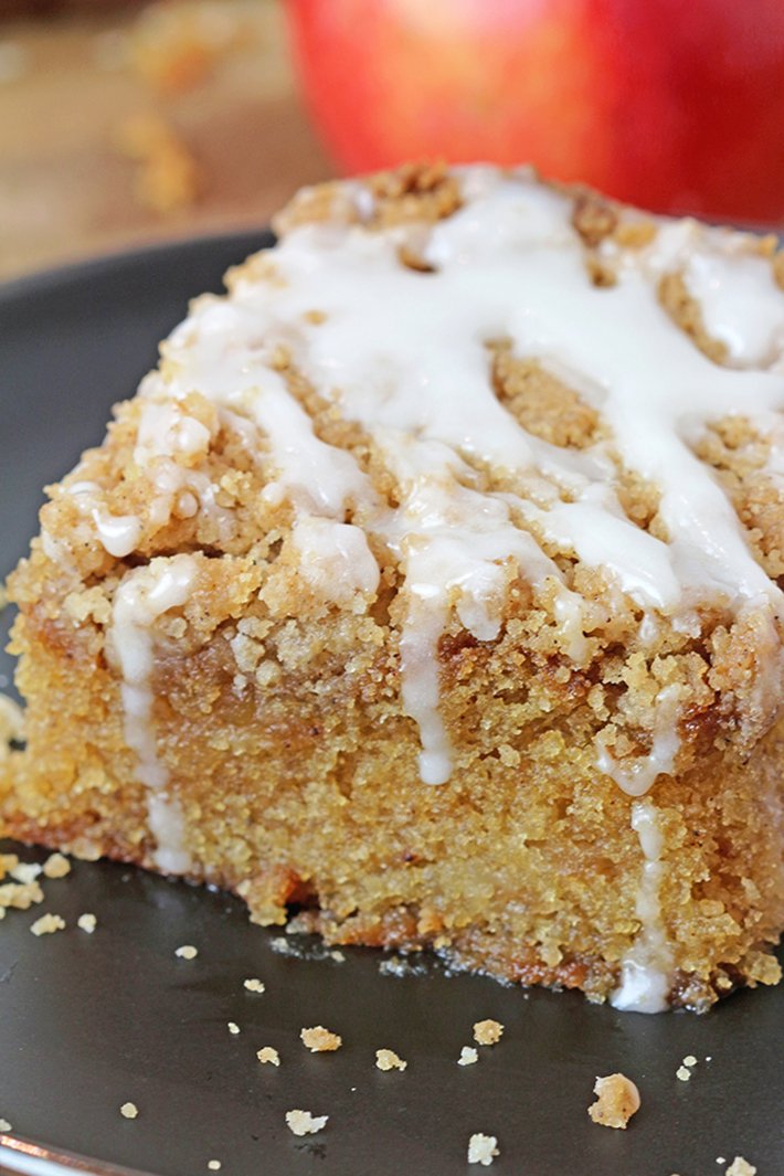 Apple Crumb Cake is a soft, moist cake filled with juicy apples and topped with an extra brown sugar cinnamon crumb topping. This perfect fall dessert holds a special place in my cookbook!
