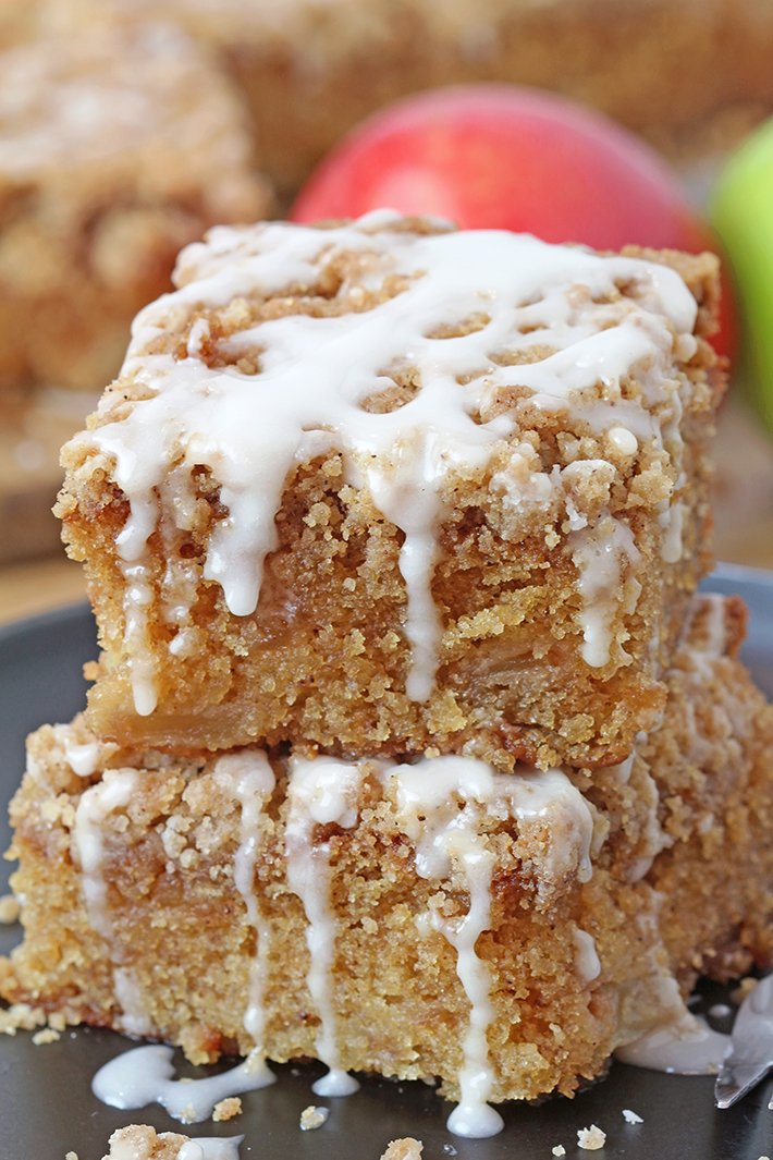 Apple Crumb Cake is a soft, moist cake filled with juicy apples and topped with an extra brown sugar cinnamon crumb topping. This perfect fall dessert holds a special place in my cookbook!