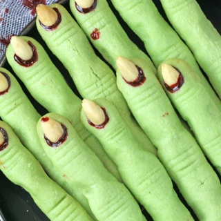 Close-up of creepy Witch Finger Cookies with almond nails for Halloween