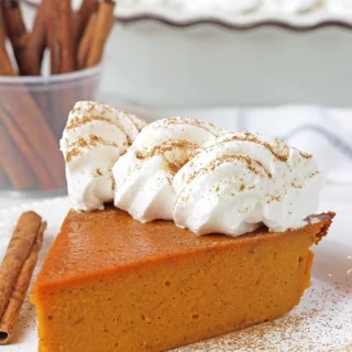 This Easy Crustless Pumpkin Pie is a perfect Thanksgiving recipe that can be prepared in just a few minutes! No crust, fewer calories, and a total time-saver! Quick and simple, rich in flavor, creamy, and silky-smooth — this pie is the perfect choice for a fall dessert.