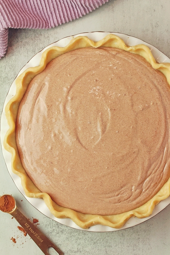 Pour the mixture into the prepared pie crust and bake at 350°F (175°C) for about 40 minutes.