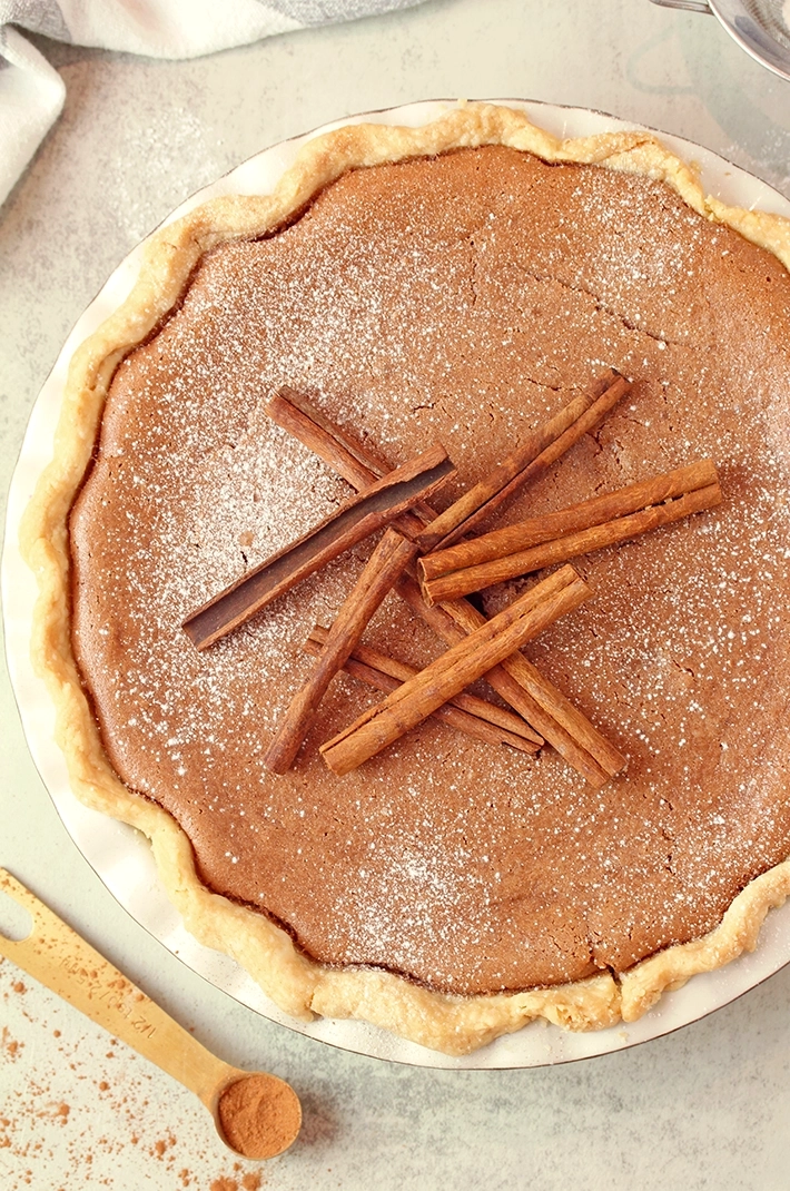 Let the pie cool at room temperature, then refrigerate it for about 3 hours.
Before serving, dust with powdered sugar. Serve with whipped topping or a scoop of vanilla ice cream.