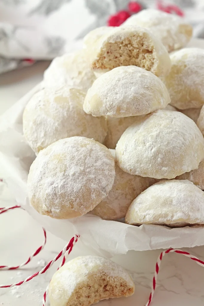 Holiday Snowball Cookies — these buttery, melt-in-your-mouth classics made with just 5 ingredients are perfect for Christmas!