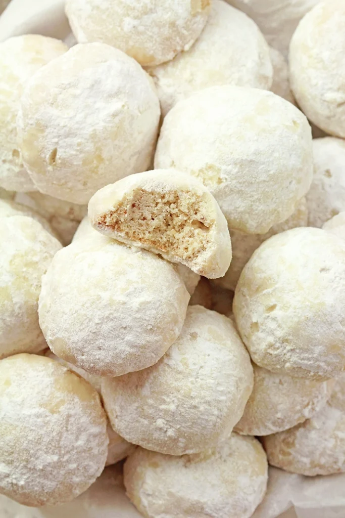 Holiday Snowball Cookies — these buttery, melt-in-your-mouth classics made with just 5 ingredients are perfect for Christmas!