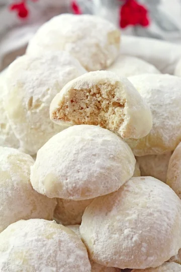 Holiday Snowball Cookies — these buttery, melt-in-your-mouth classics made with just 5 ingredients are perfect for Christmas. They’re soft, slightly crumbly, and rolled in a fine layer of powdered sugar, just like real snowballs that melt in your mouth!