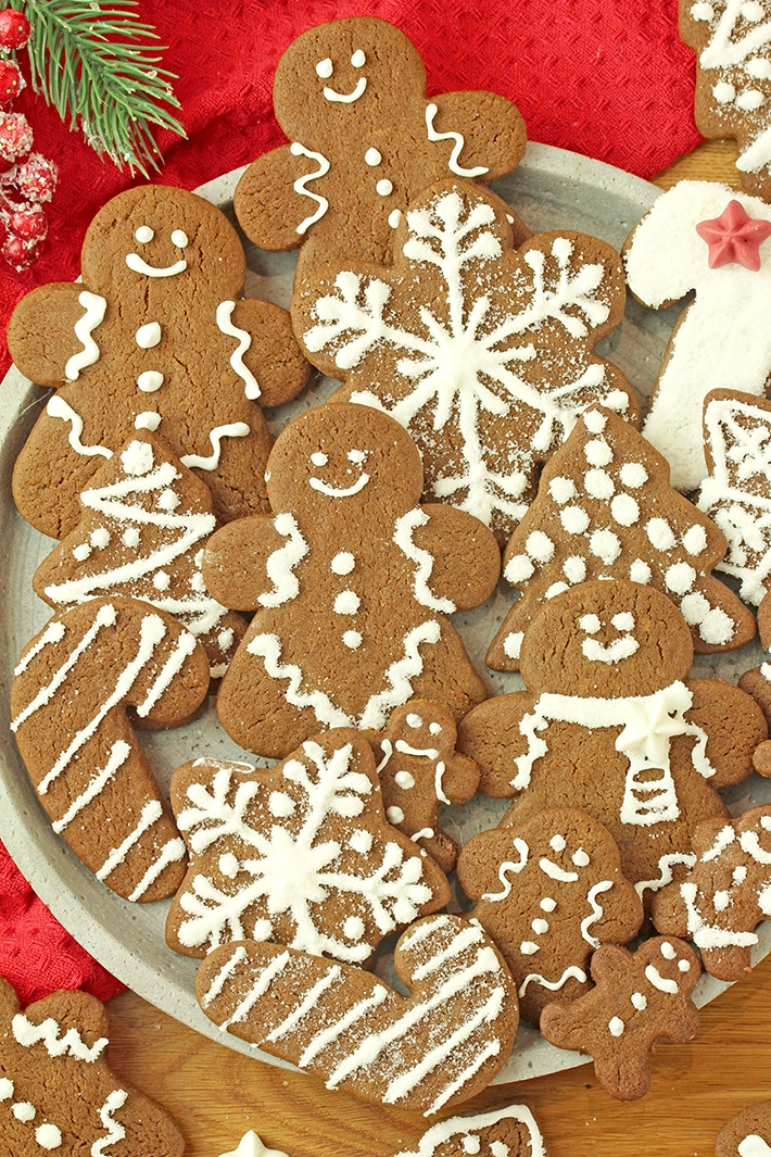 These Soft Gingerbread Cookies with Royal Icing are a simple homemade recipe for Christmas and Holiday baking. Made with warm spices and rich molasses, they stay soft and hold their shape while baking, which makes them ideal for decorating with royal icing.