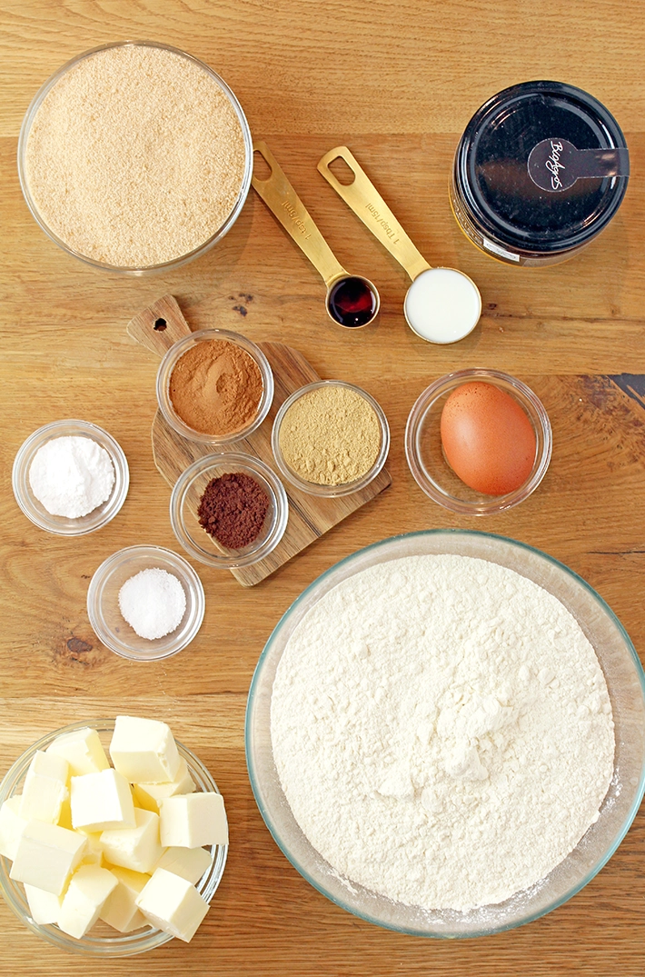 KEY Ingredients:
all purpose flour
ground cinnamon
ground ginger
ground cloves
baking soda
fine sea salt
unsalted butter
dark or light brown sugar
unsulphured dark molasses
egg
vanilla extract
milk
granulated sugar for decorations