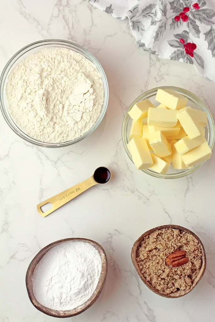 Holiday Snowball Cookies — these buttery, melt-in-your-mouth classics made with just 5 ingredients are perfect for Christmas!
