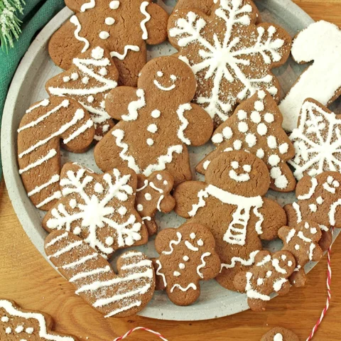 These Soft Gingerbread Cookies with Royal Icing are a simple homemade recipe for Christmas and Holiday baking. Made with warm spices and rich molasses, they stay soft and hold their shape while baking, which makes them ideal for decorating with royal icing.