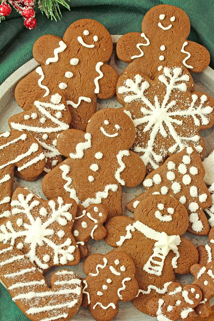 These Soft Gingerbread Cookies with Royal Icing are a simple homemade recipe for Christmas and Holiday baking. Made with warm spices and rich molasses, they stay soft and hold their shape while baking, which makes them ideal for decorating with royal icing.