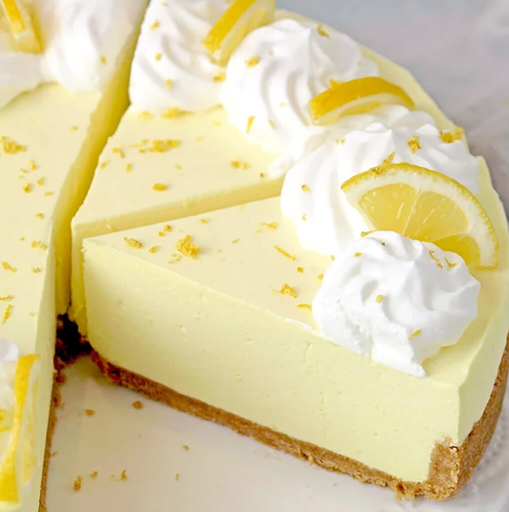 The Easiest Lemon Cheesecake - this no bake recipe with graham cracker crust, creamy cheesecake and lemon Jell-O filling is so quick and easy to make