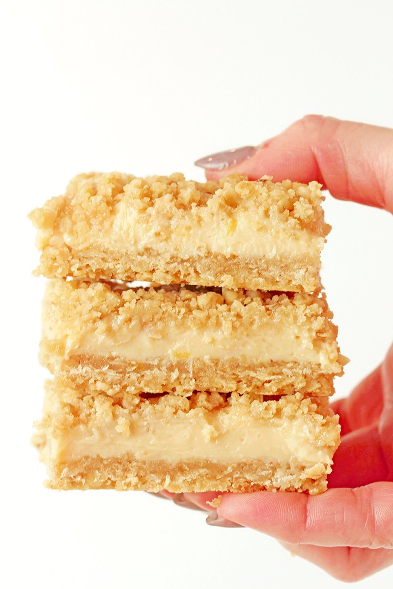 These Easy Lemon Crumb Bars have a buttery oat shortbread crust, a creamy fresh lemon filling made with sweetened condensed milk, and a rich crumb topping that bakes up golden and crisp. They’re the ultimate easy lemon dessert for spring and summer — perfect for Easter, Mother’s Day, BBQs, potlucks, or anytime you’re craving something bright and refreshing.