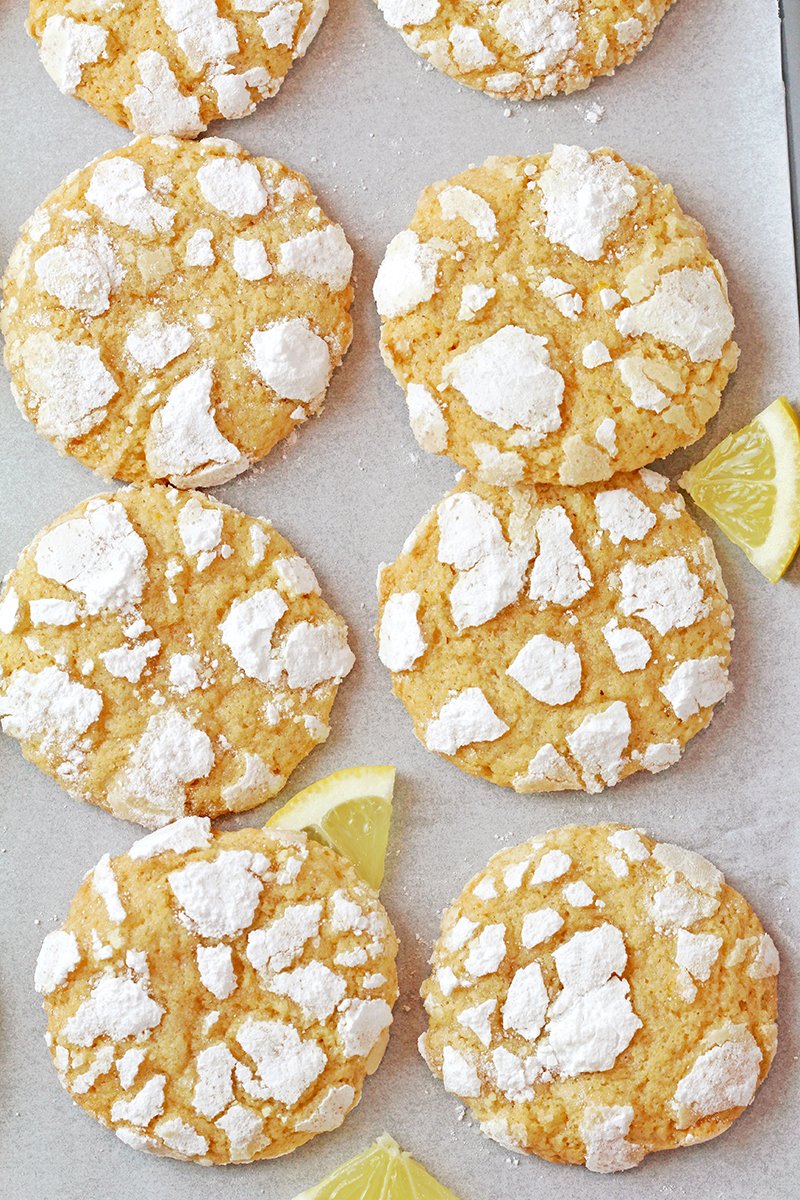Easy Lemon Crinkle Cookies - soft & chewy with fresh lemon juice, perfect for Easter! Coated in powdered sugar for the ultimate crinkle.
