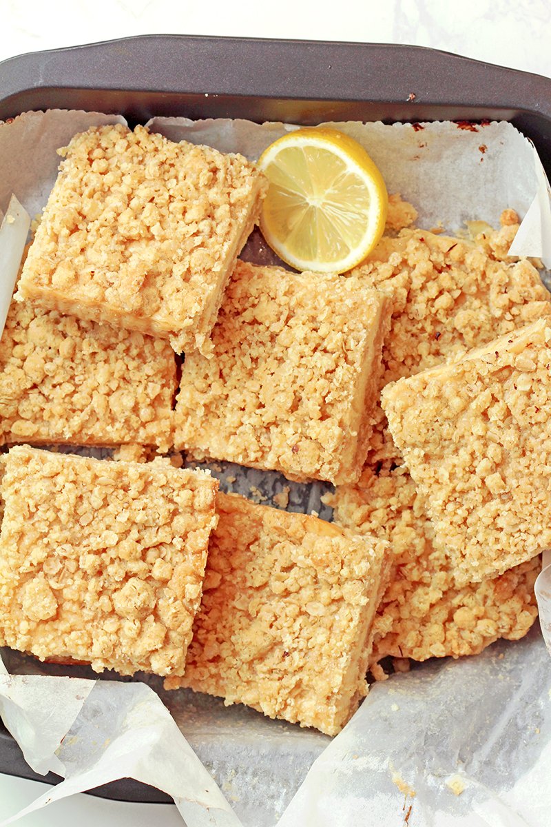These Easy Lemon Crumb Bars have a buttery oat shortbread crust, a creamy fresh lemon filling made with sweetened condensed milk, and a rich crumb topping that bakes up golden and crisp. They’re the ultimate easy lemon dessert for spring and summer — perfect for Easter, Mother’s Day, BBQs, potlucks, or anytime you’re craving something bright and refreshing.