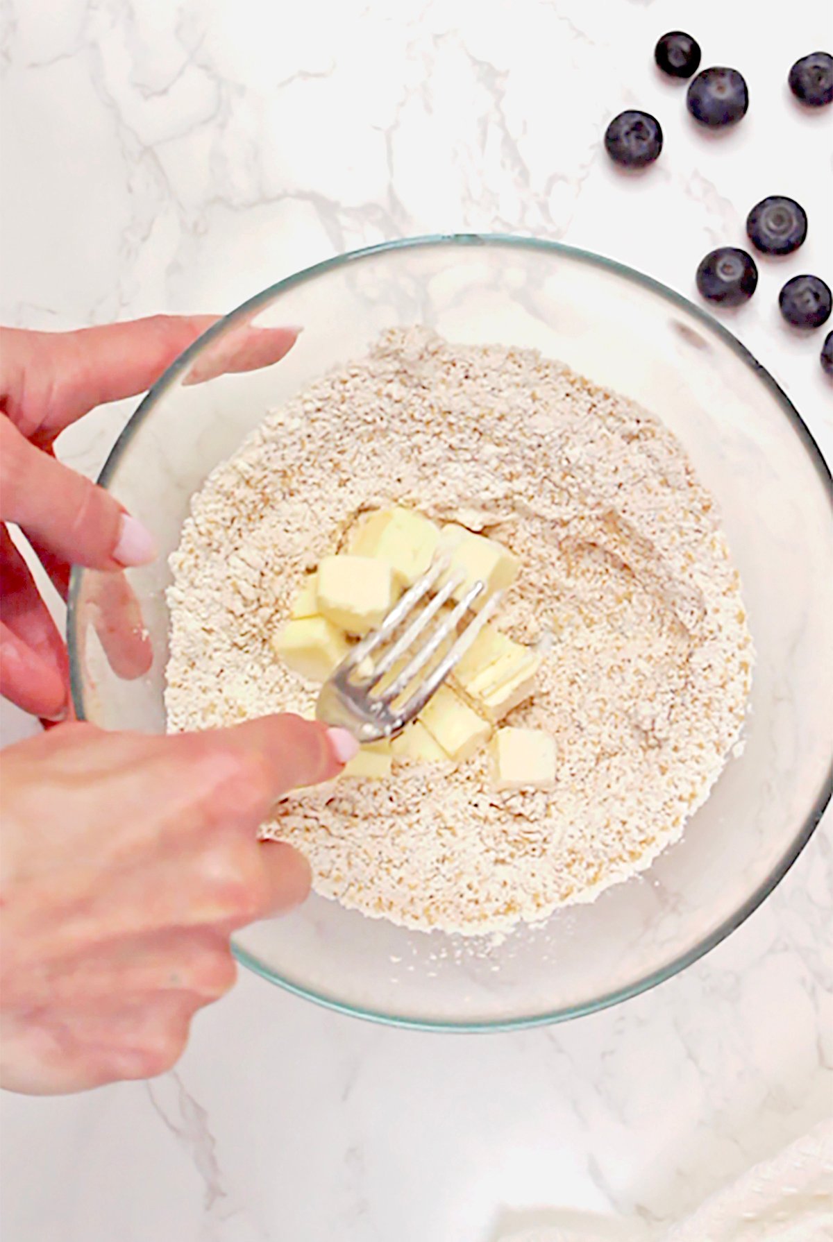 Step 1. Make the Crumb Topping
Combine flour, brown sugar, and cinnamon in a bowl. Add small pieces of cold butter and use a fork or pastry cutter to create coarse crumbs.