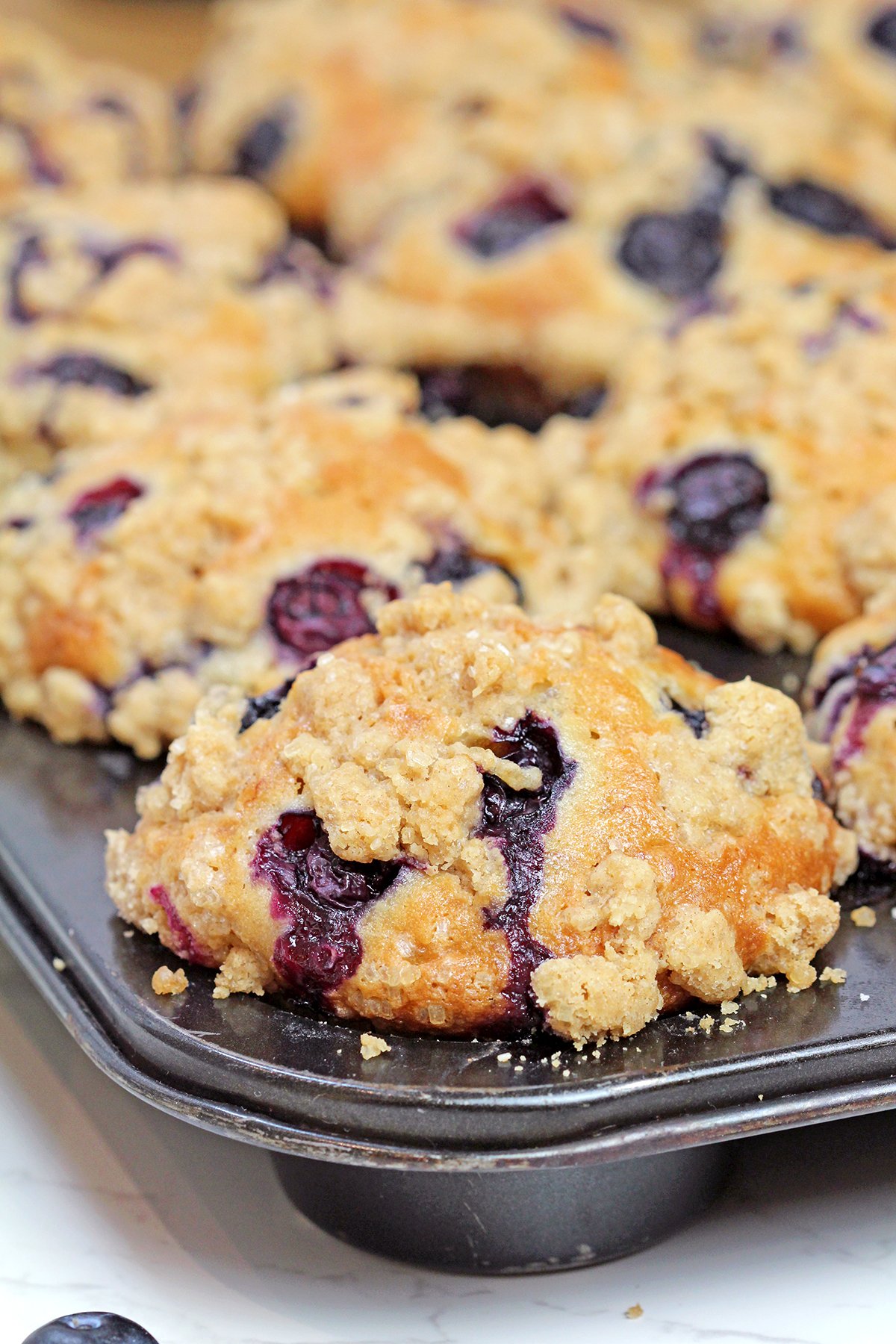 Bake for 25–30 minutes, or until the tops are golden brown and a toothpick inserted into the center comes out clean. Allow the muffins to cool in the pan for about 15 minutes before transferring them to a wire rack.