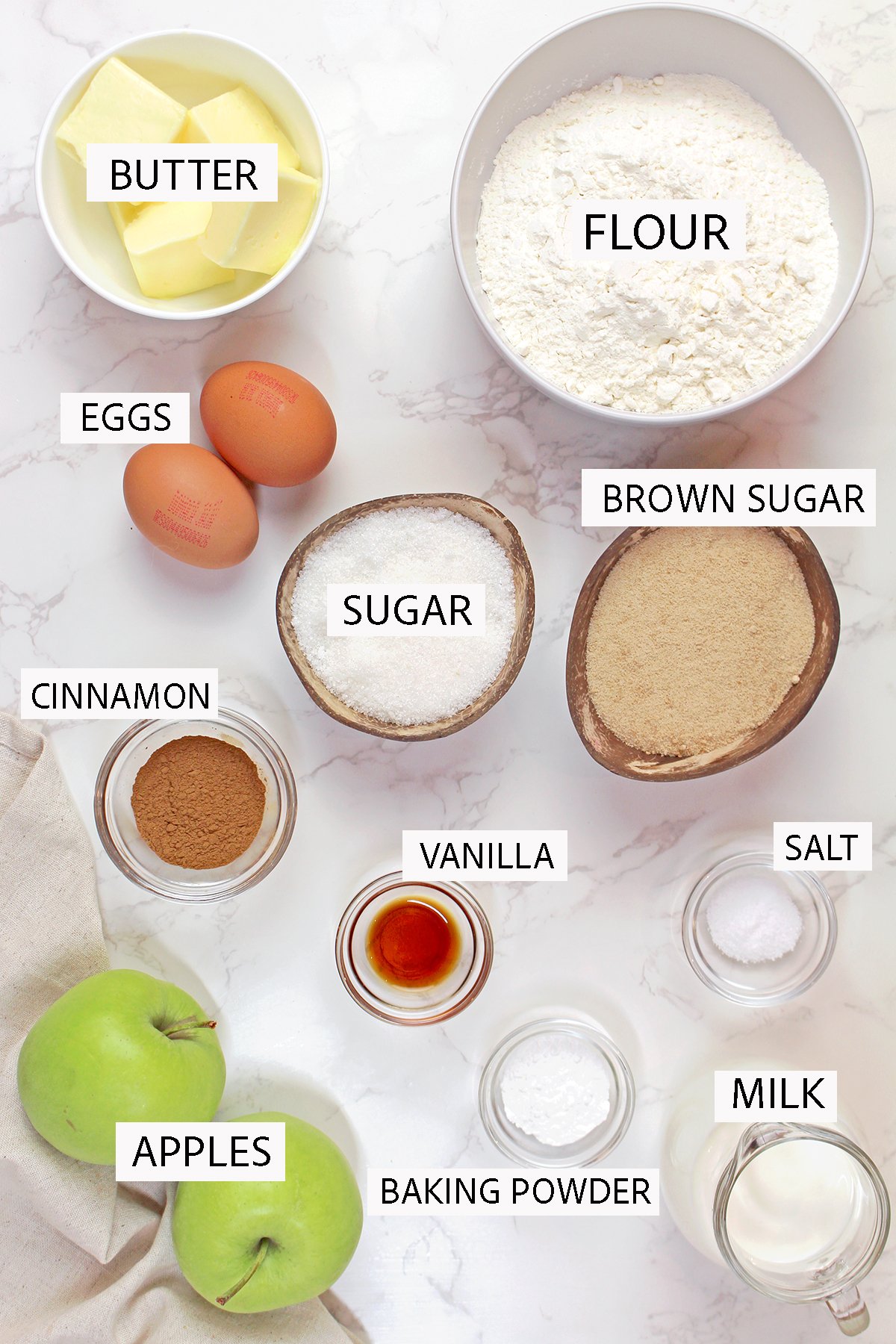 Ingredients include apples, flour, butter, eggs, milk, and cinnamon.