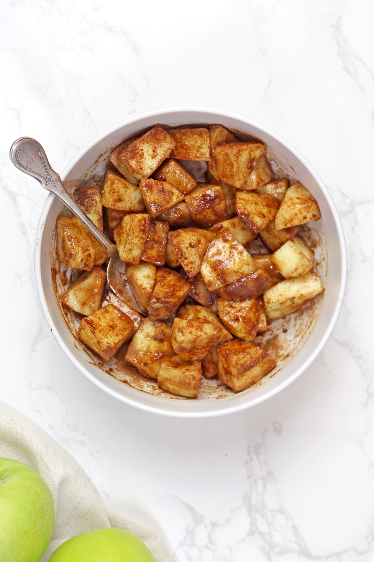 Step 2 - Diced apples tossed with cinnamon and sugar.