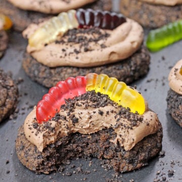 Dirt Cake Cookie with a bite showing its soft, chewy texture.