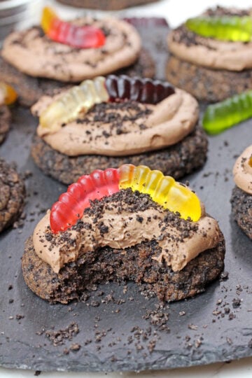 Dirt Cake Cookie with a bite showing its soft, chewy texture.